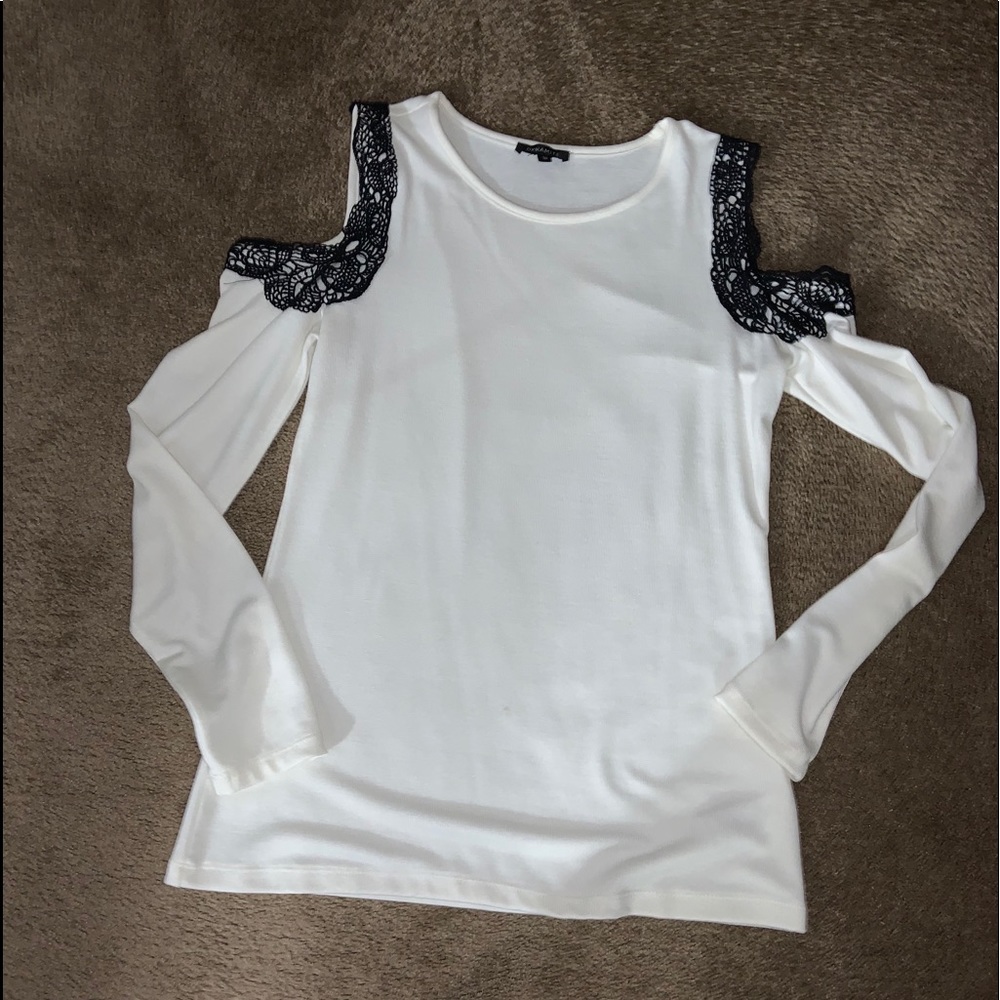 White sweater with lace shoulders